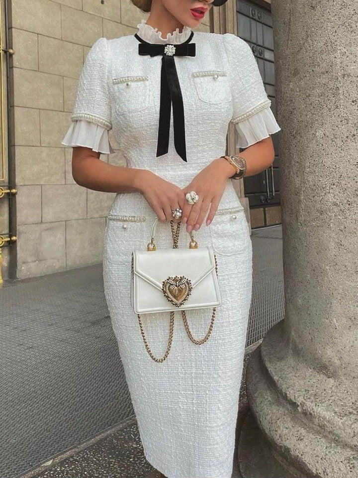 Robe midi formelle en tweed avec bordure en perles et nœud
