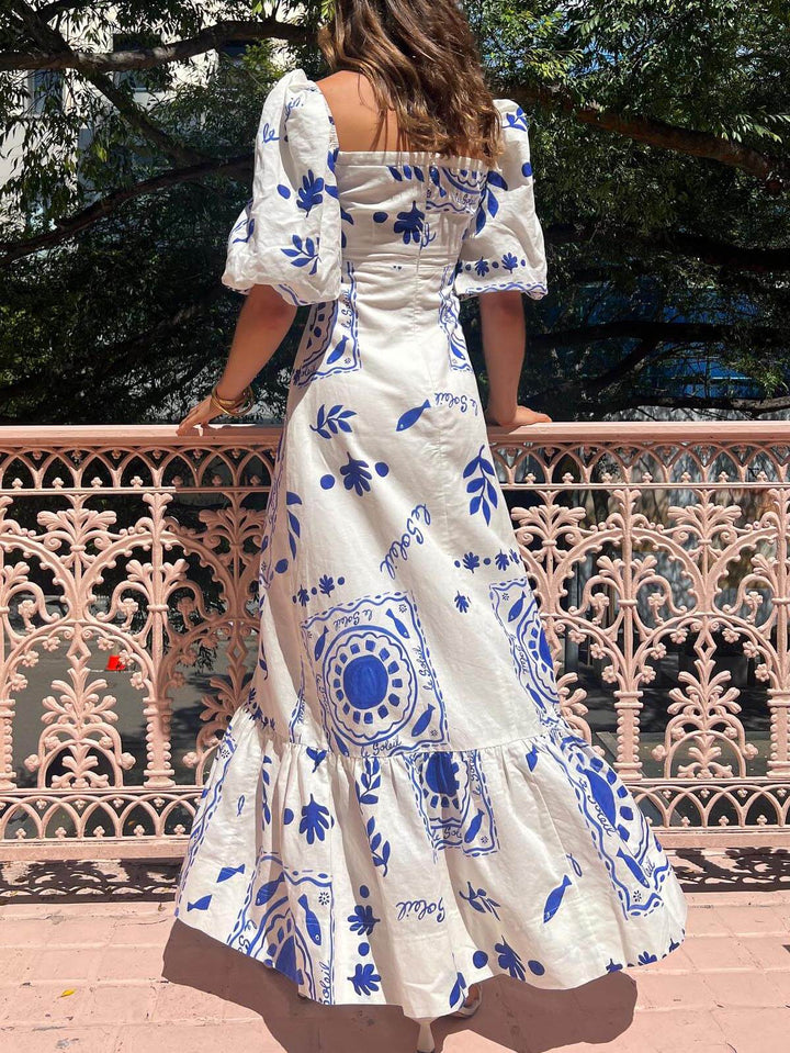 Robe mi-longue à manches bouffantes pour les vacances