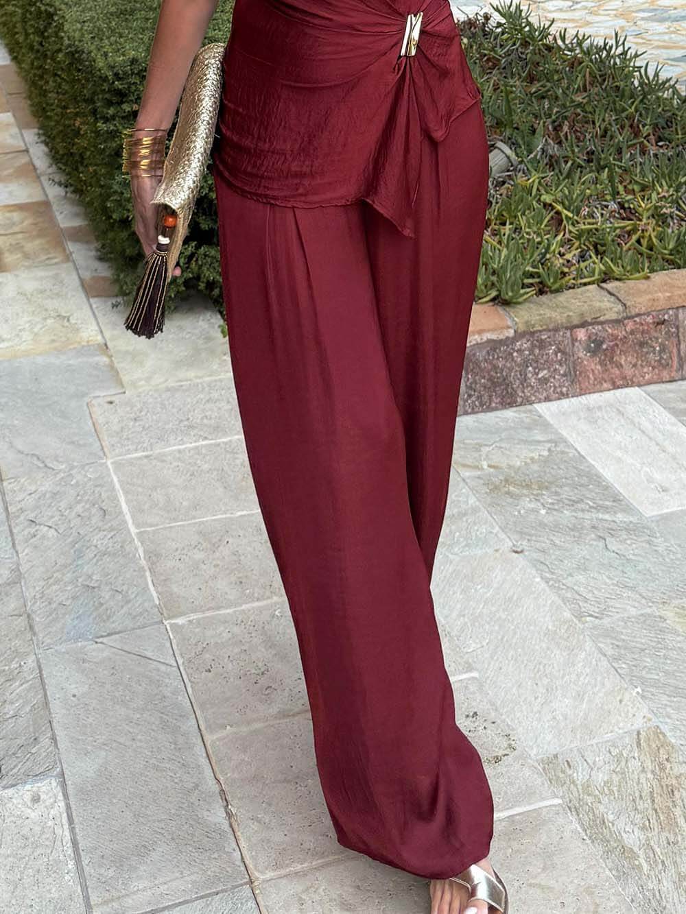 Unique Asymmetric Hem Metallic Accents Top