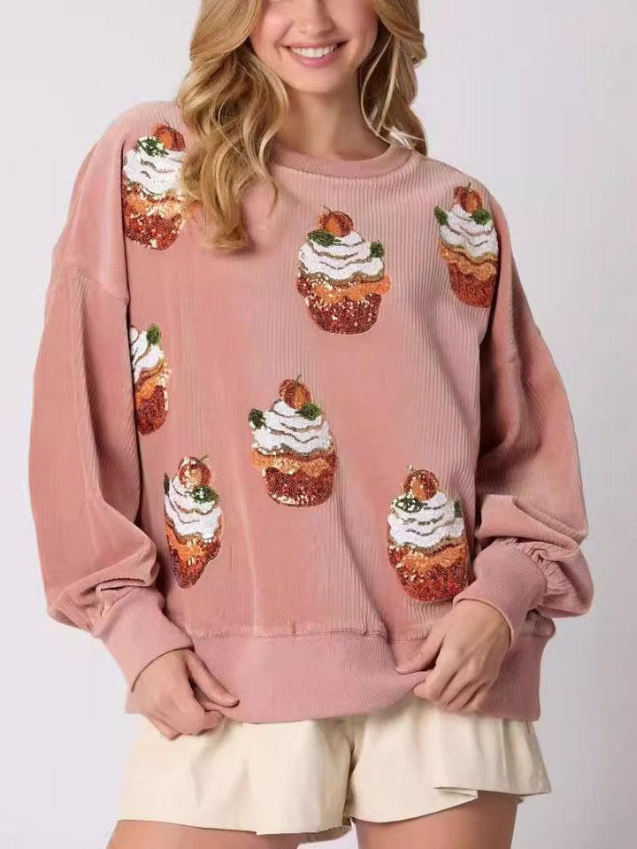 Weihnachtskuchen-Pullover mit Pailletten