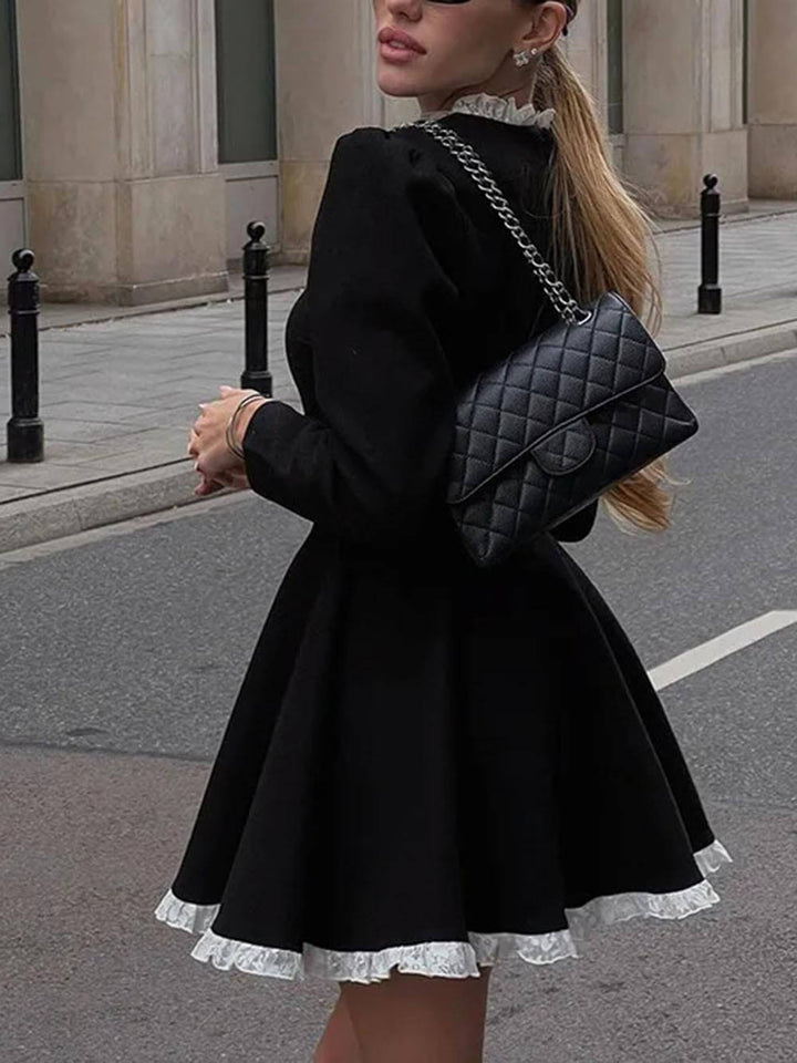 Elegante mini-jurk met kanten paneel, hoge taille en lange mouwen