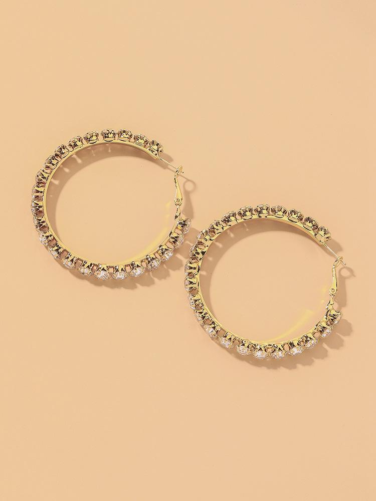 Übertriebene Diamant-Silbernadel-Ohrringe mit großem Kreis